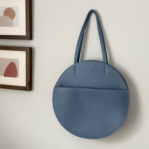 Aritzia Handbags - Aritzia urban originals blue circle round purse